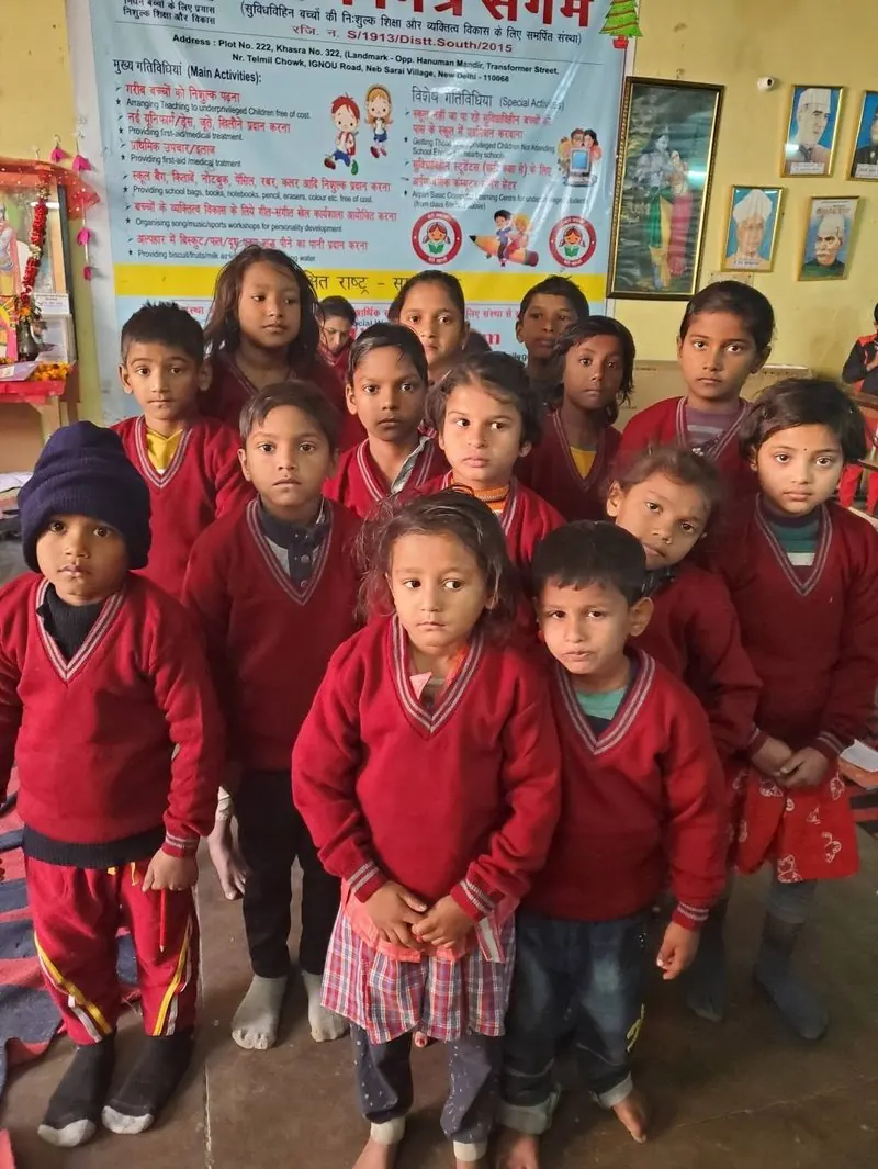 Children in their new school sweaters at the Arpan Mitra Sangam centre