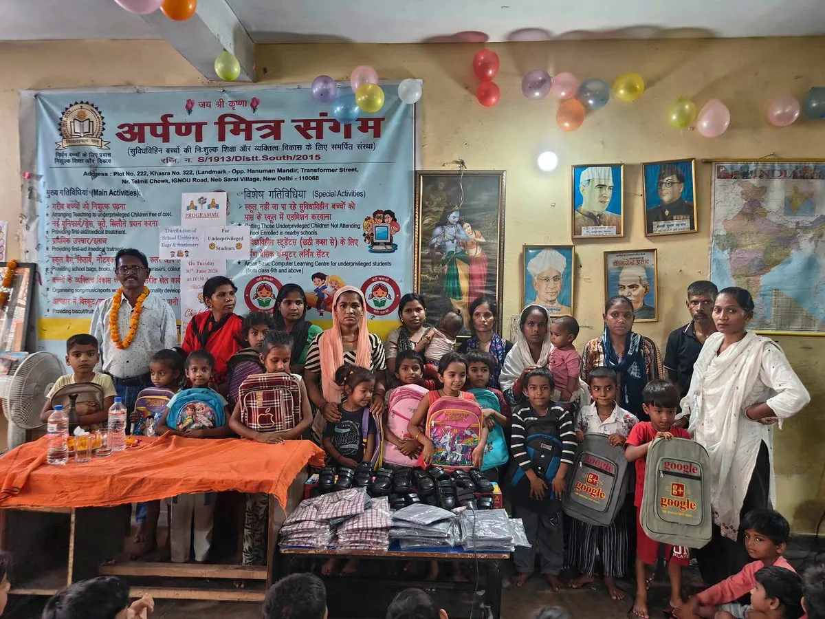 Parents, volunteers and children at a school uniform, bag and stationery distribution