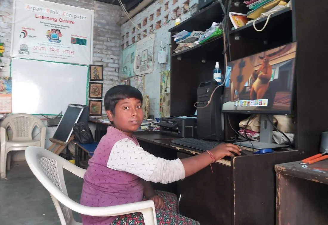 A boy learning at the Arpan Basic Computer Learning Centre