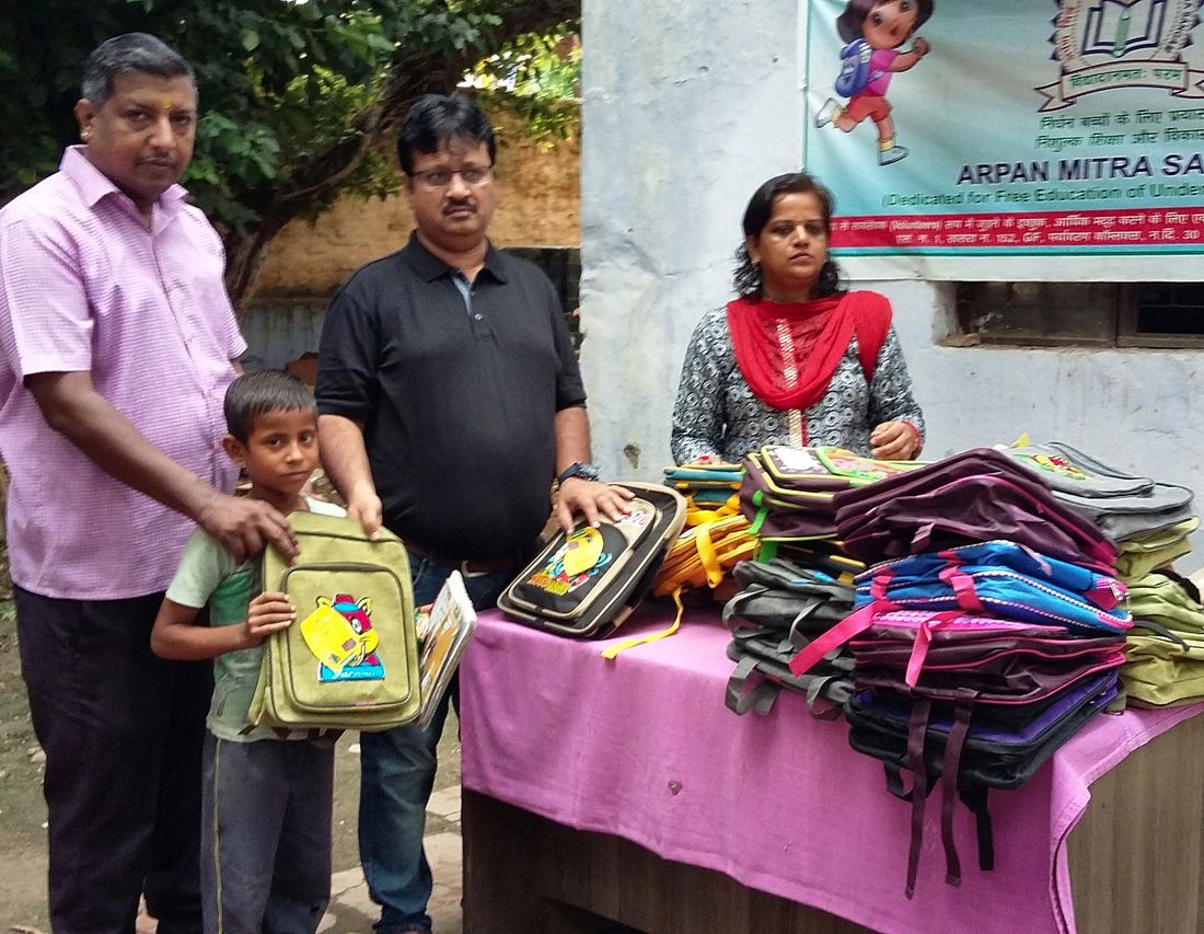 New school bags laid out for distribution